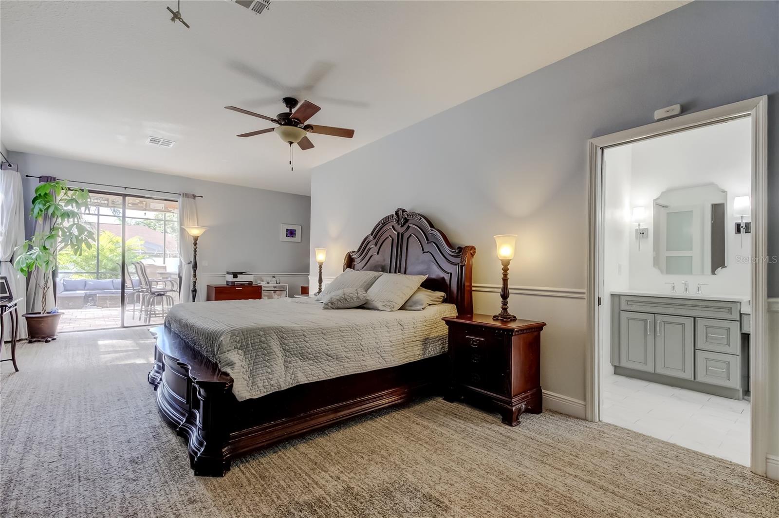 The expansive primary suite provides a private and tranquil retreat with a spa-inspired ensuite bath and generous walk-in closet space.