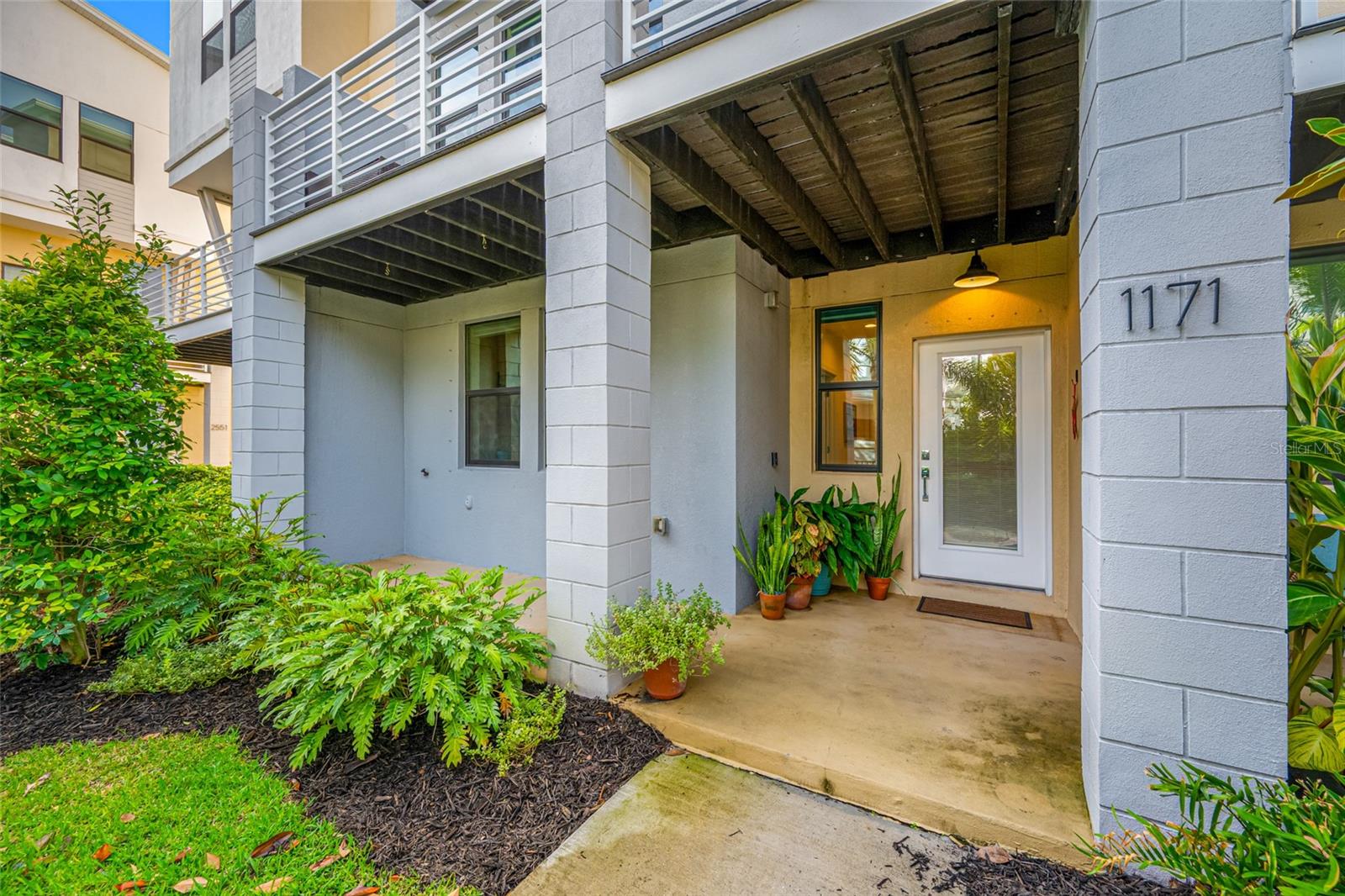 1171 25th Lane N, St Petersburg, FL 33713  - Front Door 1171 25th Lane N, St Petersburg, FL 33713  - Front Door covered front patio area facing courtyard and pool