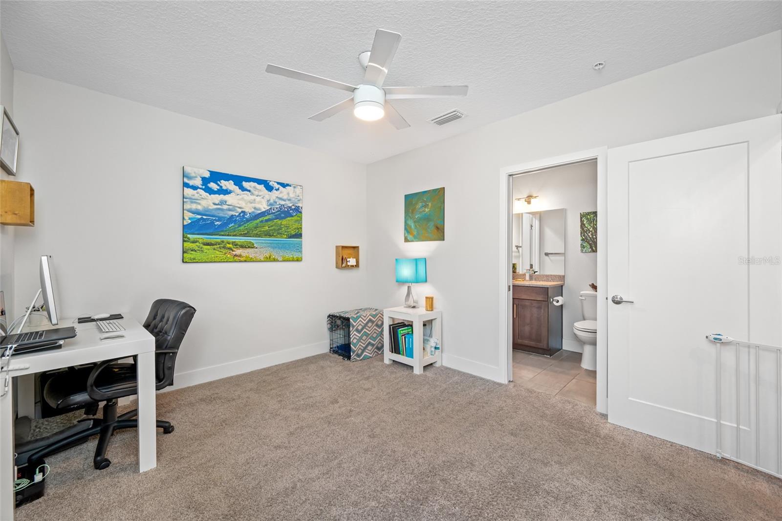 First Floor - Bedroom 3 with en-suite full bathroom & walk-in closet.