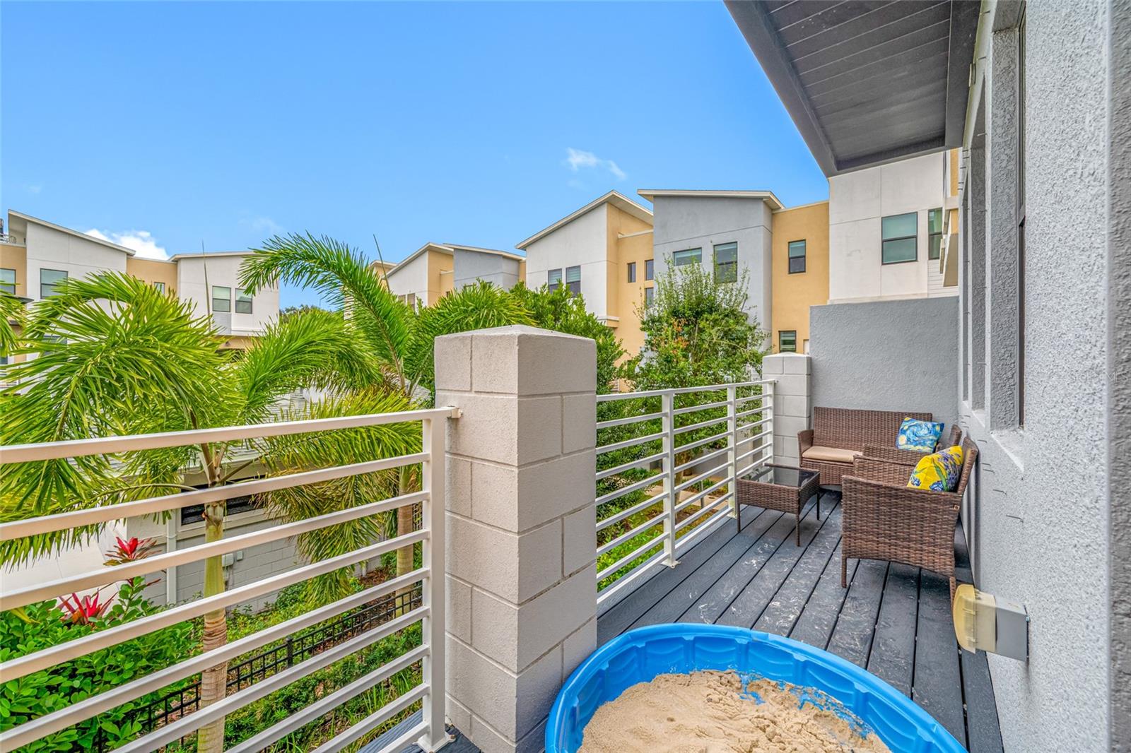 Second Floor private balcony overlooking the pool and courtyard