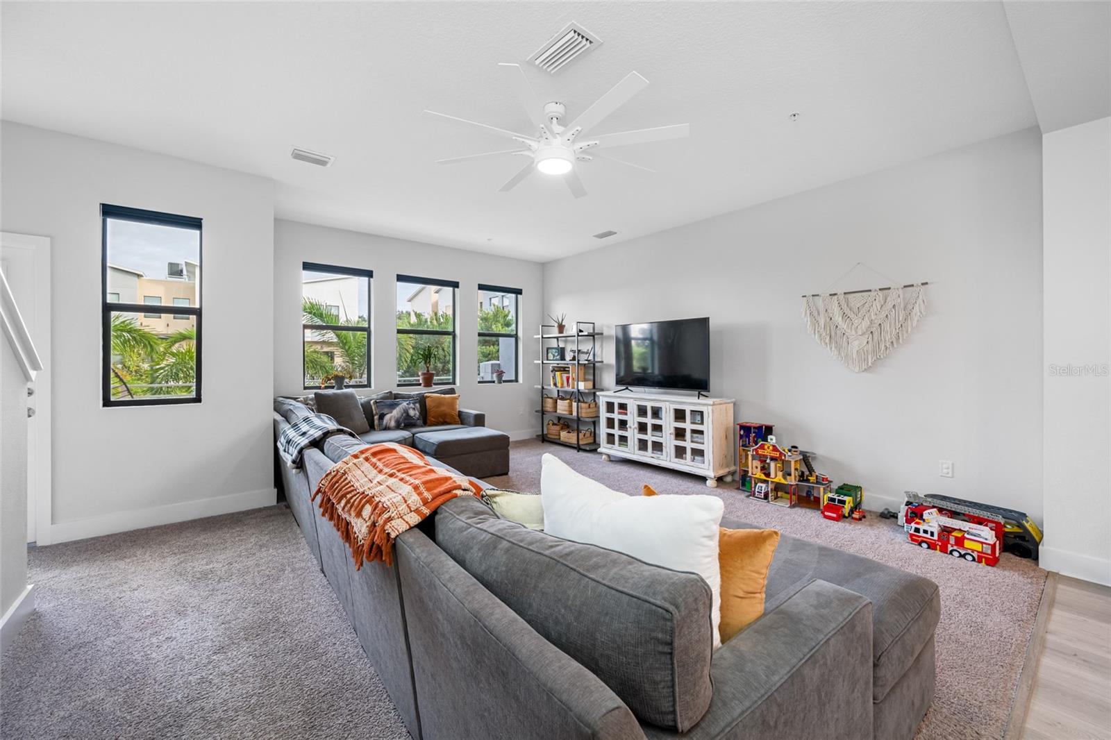 Open layout Living, Dining and Kitchen Area with 10ft ceilings and lots of natural light on the 2nd floor.