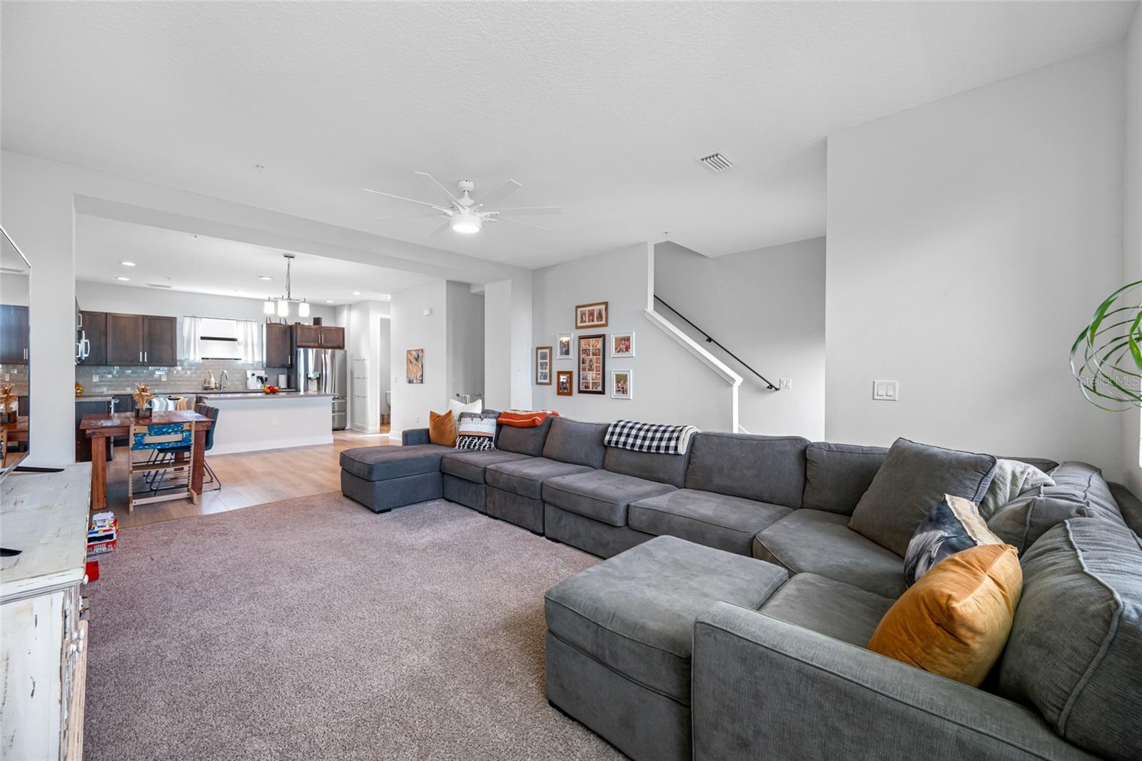 Open layout Living, Dining and Kitchen Area with 10ft ceilings and lots of natural light on the 2nd floor.