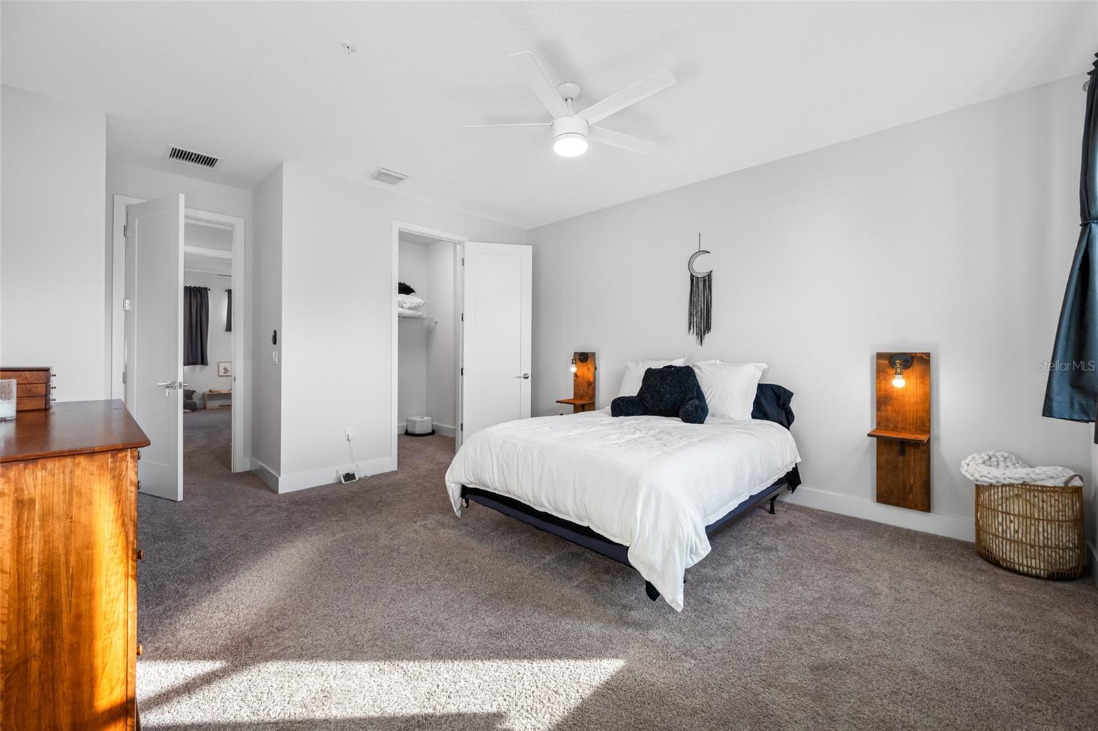 Large primary suite features 10ft ceilings, walk-in closet, ensuite bathroom with dual vanity and walk-in shower. Third Floor