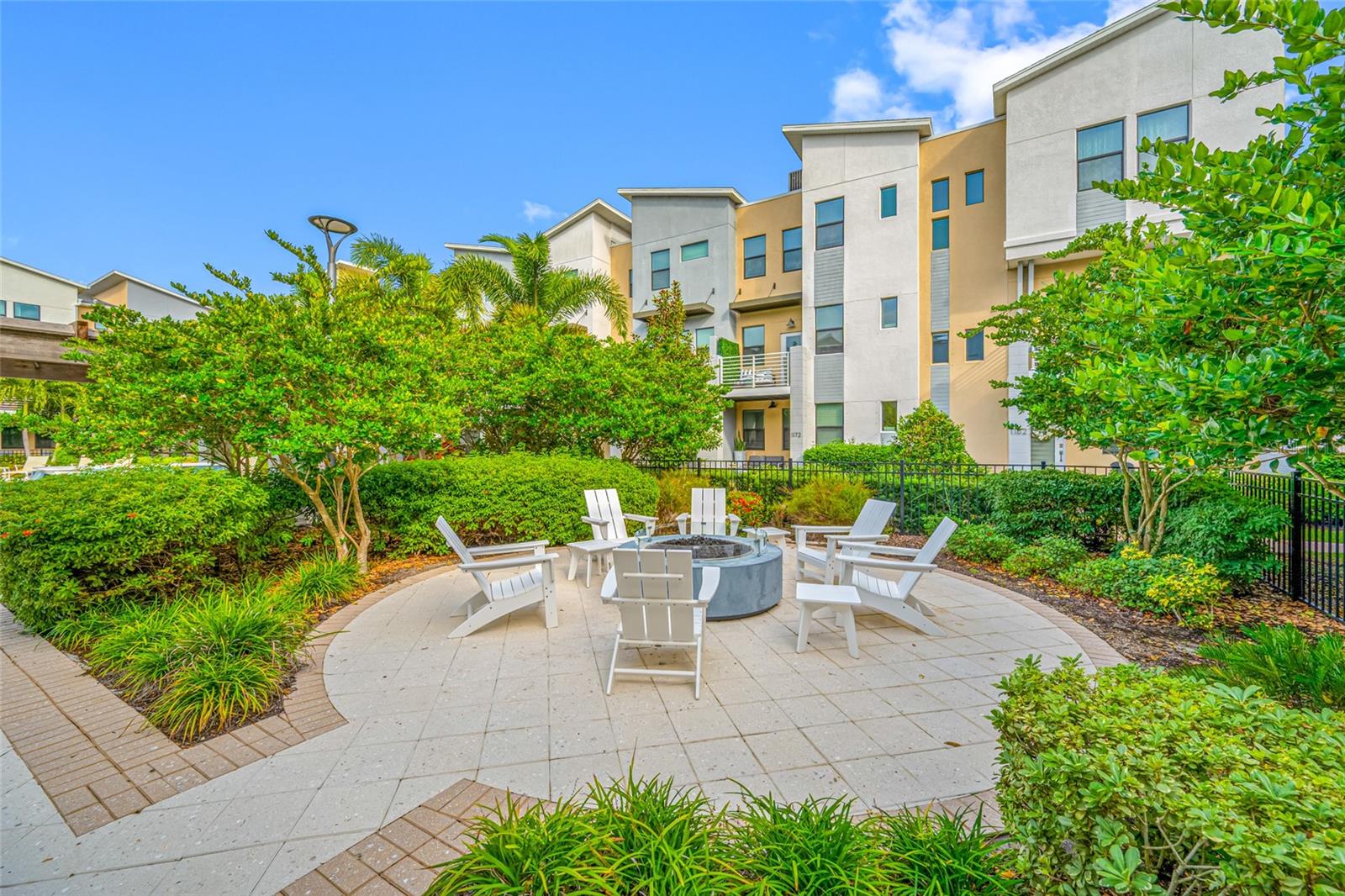 1171 25th Lane N, St Petersburg, FL 33713 - 3 bed, 3.5 bath, 2 car garage, townhome overlooking pool and courtyard in Uptown Kenwood.