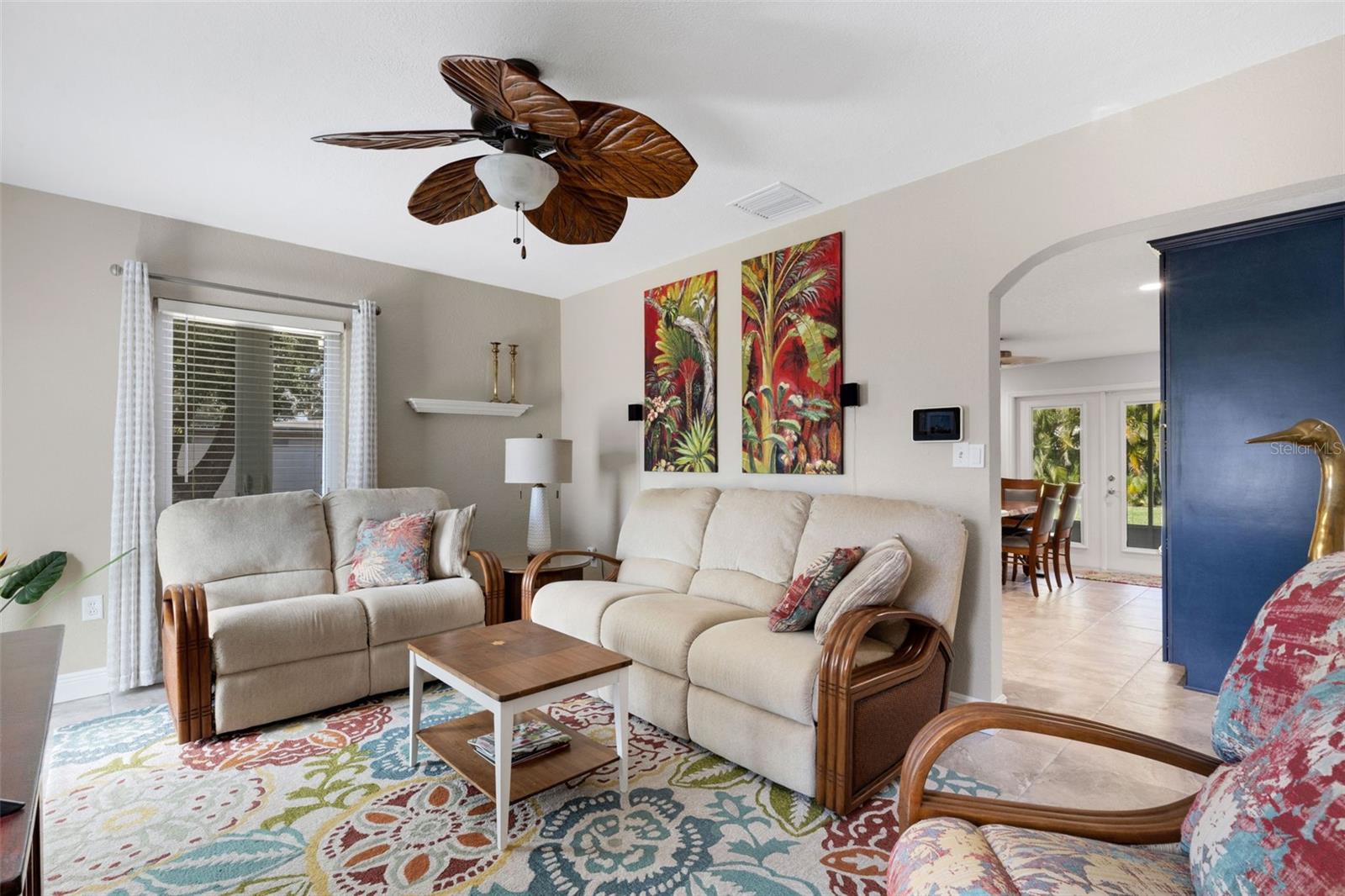 Living room next to eat in kitchen