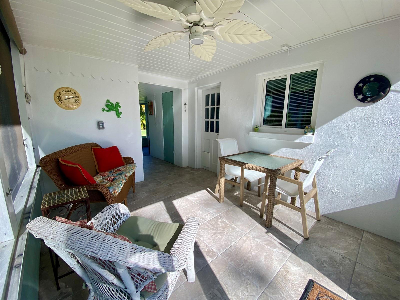 Notice the shades on the windows for rain, wind and privacy