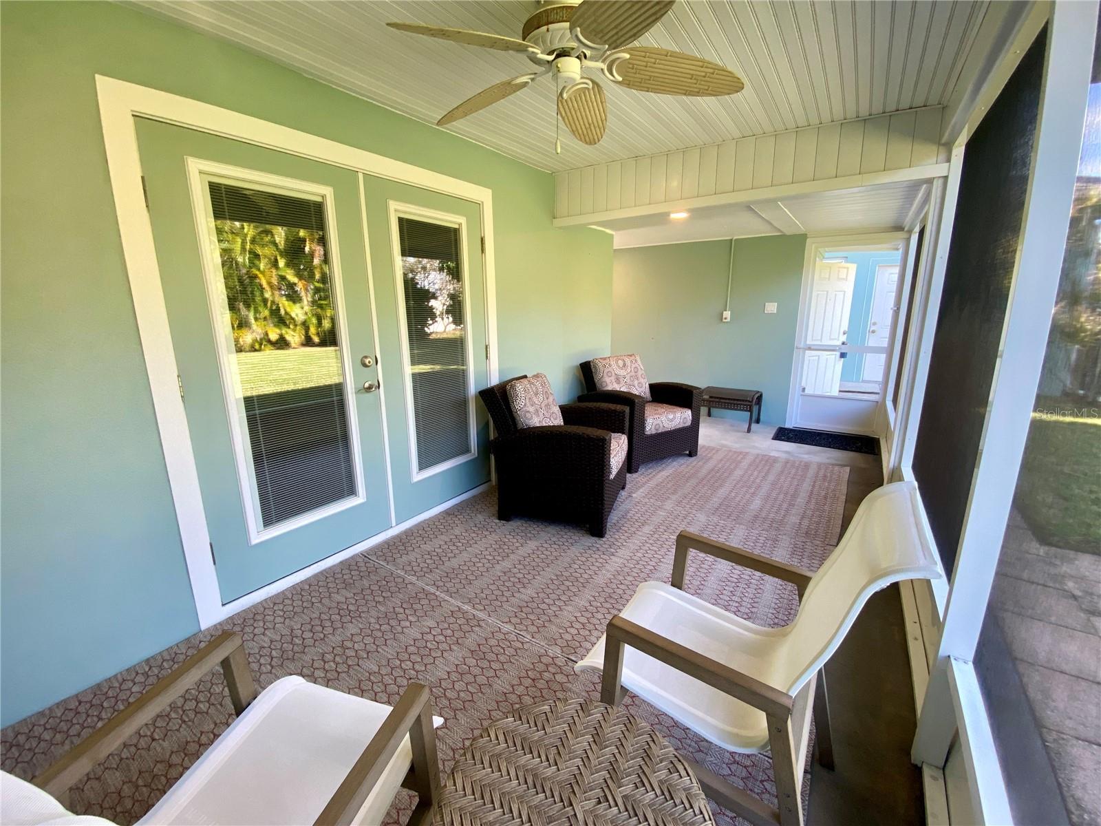 double doors lead to kitchen