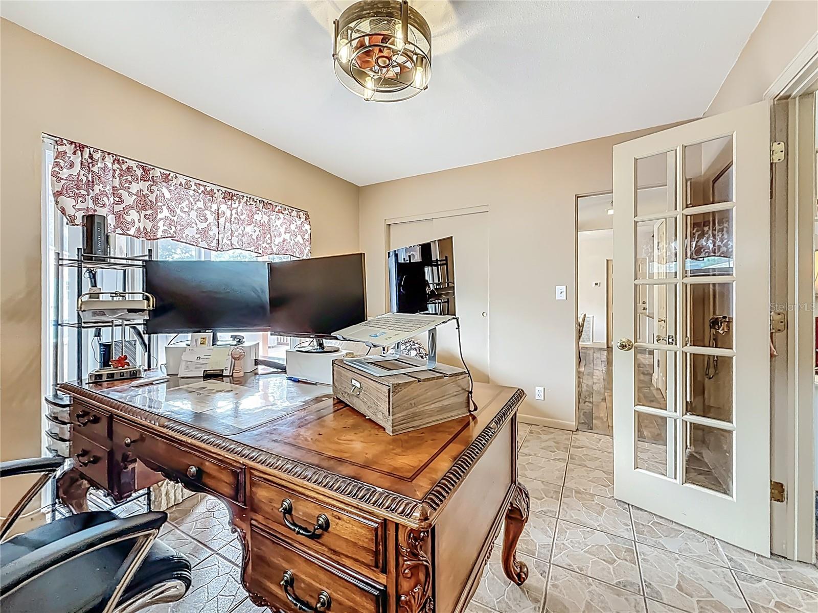 Another view within the 4th bedroom. From here you can notice the hallway, which leads to the half bath, then dining room which over overlooks the kitchen. The wall closet is to the left of the hall way access.
