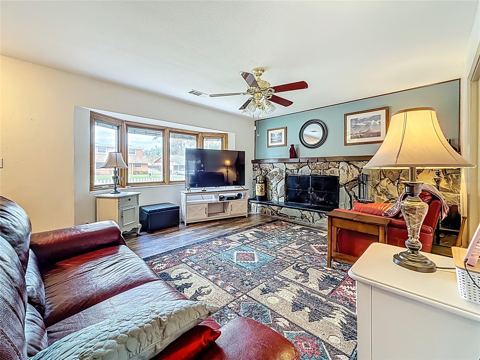 Another view of the living room. Behind you is the doorway leading to the hall & half bath.
