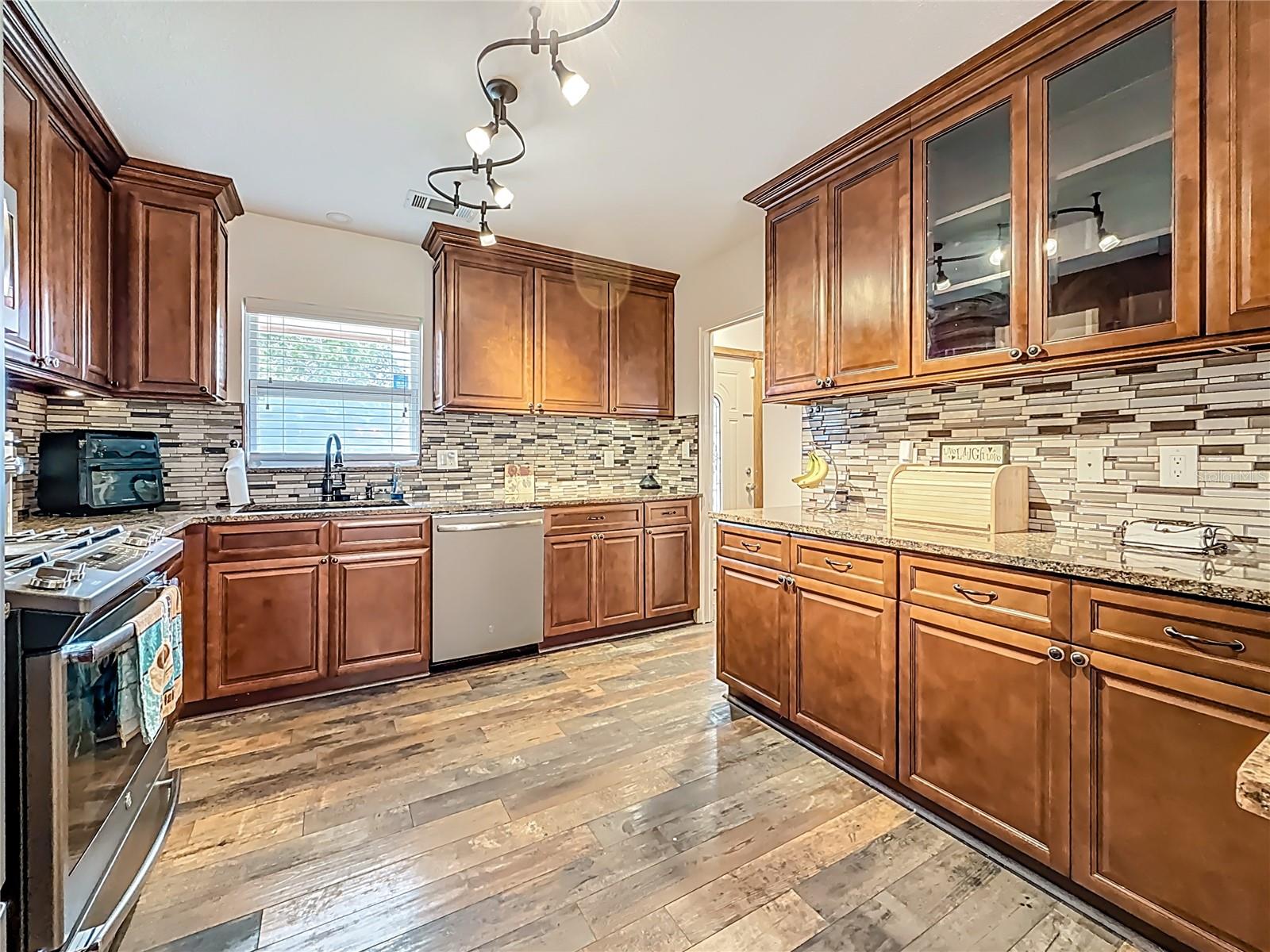 This updated kitchen has an AMAZING amount of cabinetry & counter space!