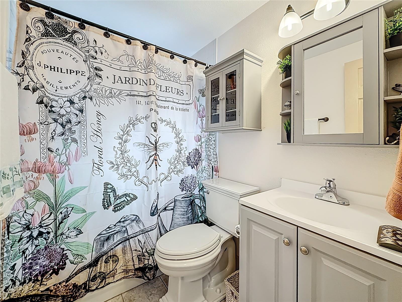 You have now made your way up the stairs to the 2nd floor. This is the shared full bath. Updated Vanity & cabinets (2025).