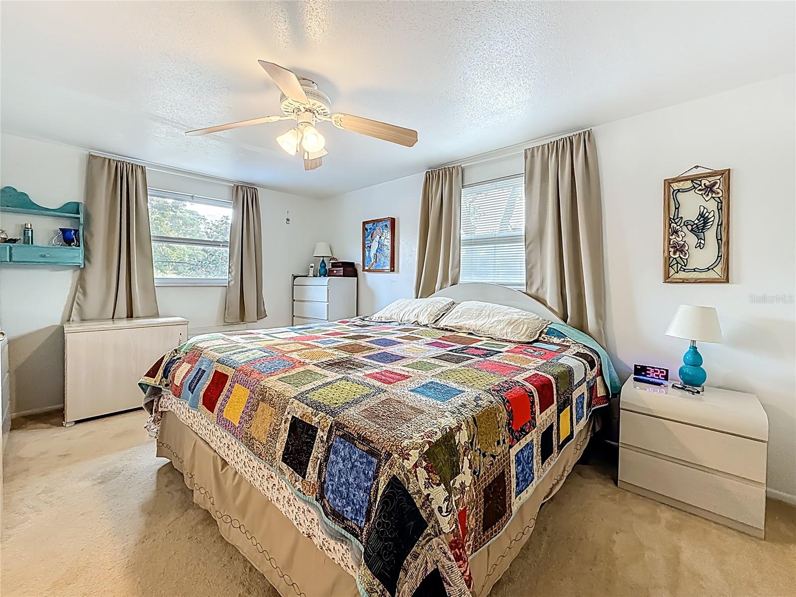 This is the largest of the 3 upstairs bedrooms. It is to your right when you get to the top of the stairs. The door is to the left (out of view in this photo) and to your right is a wide wall closest.