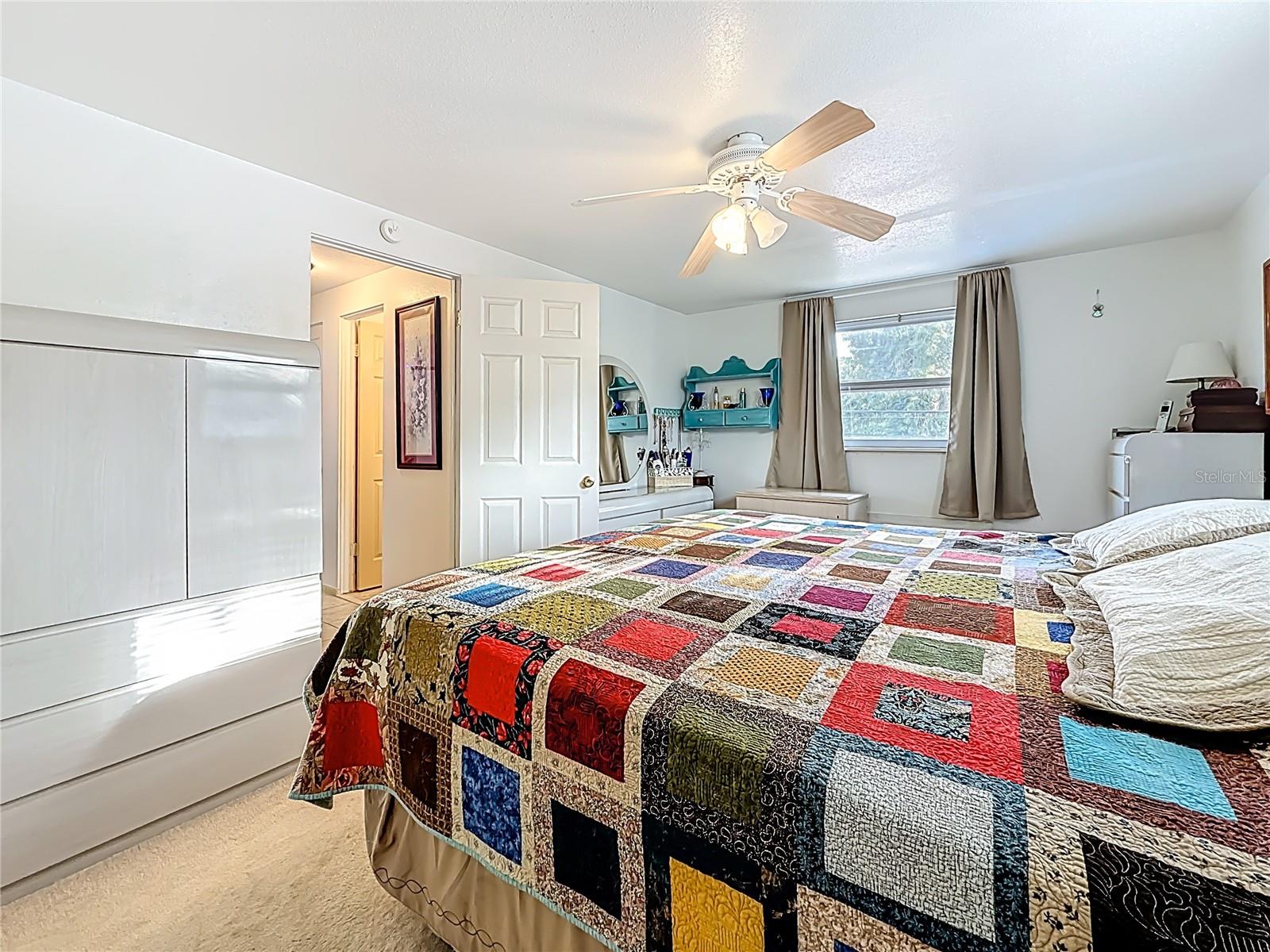 You are still in the largest of the 3 upstairs bedrooms. View is towards the entrance door. The other open door is the full bath.