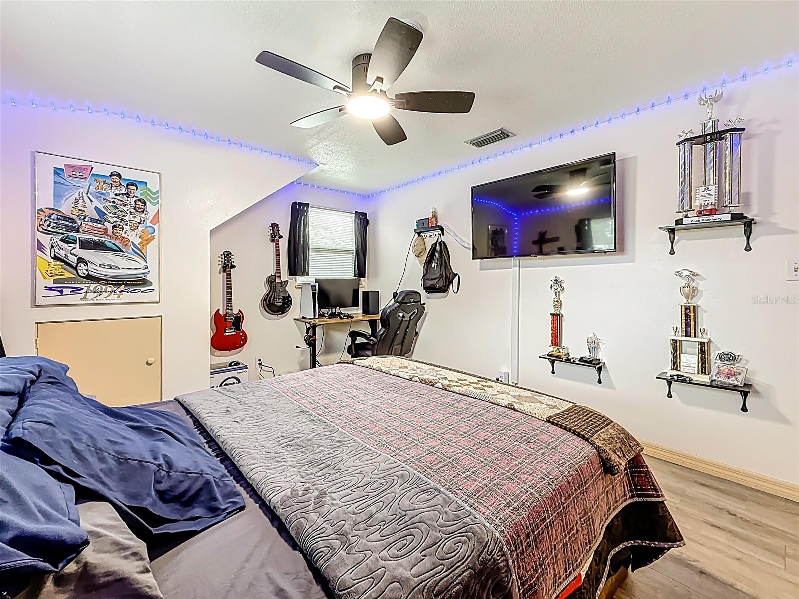 Another view of the 2nd bedroom upstairs. The entrance, along with the wall closet, are now to your right.