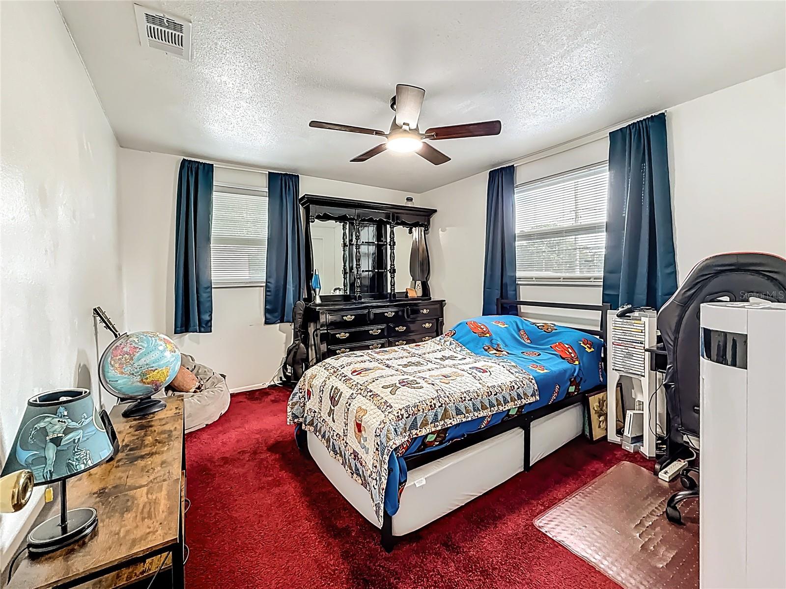 You are now in the 3rd bedroom on the 2nd floor. This one is located adjacent to bedroom 2. The window on the right faces the back yard. To your right, is the wall closet. Behind you is the hallway.