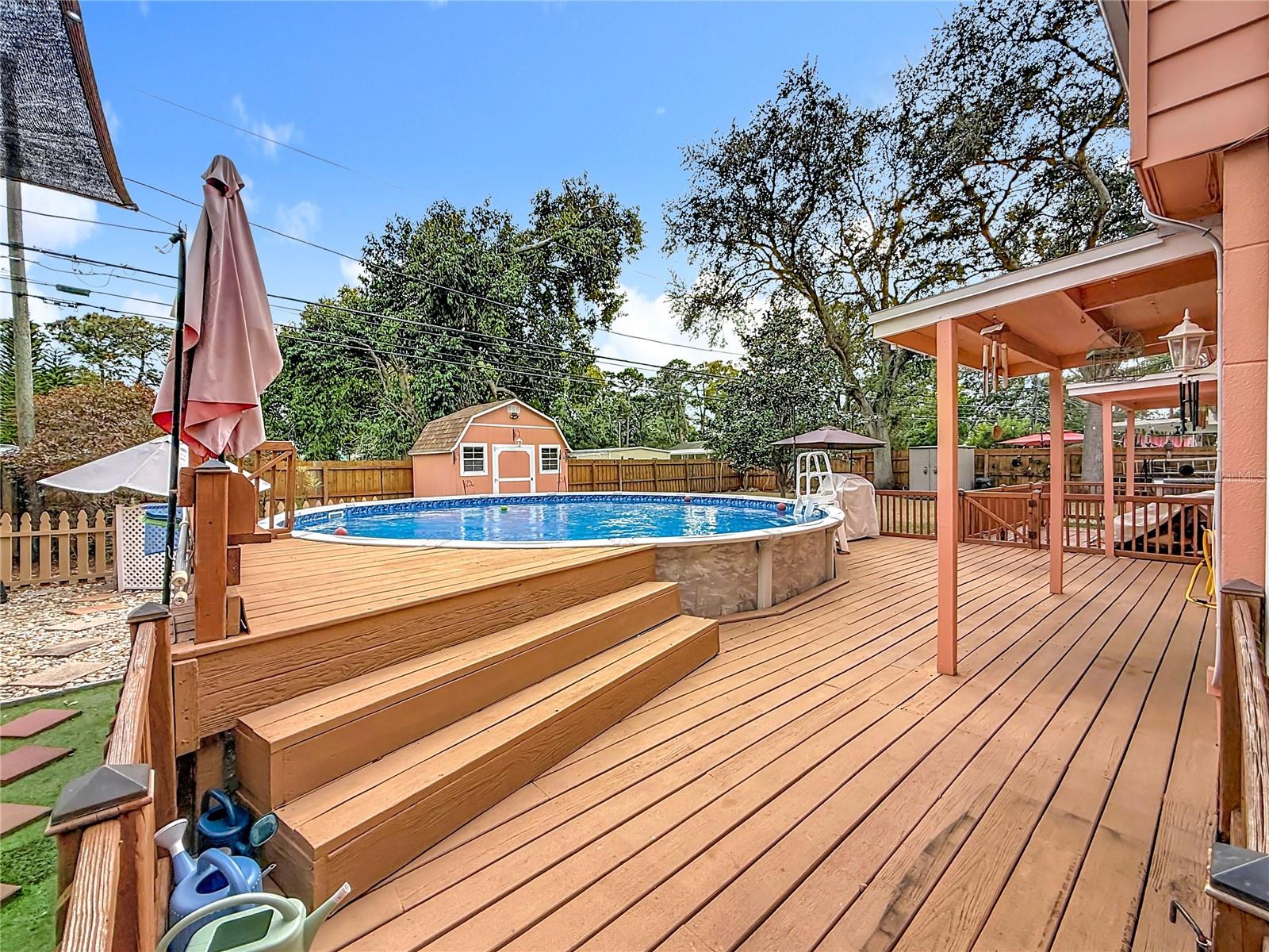 Another view of the pool and back deck.