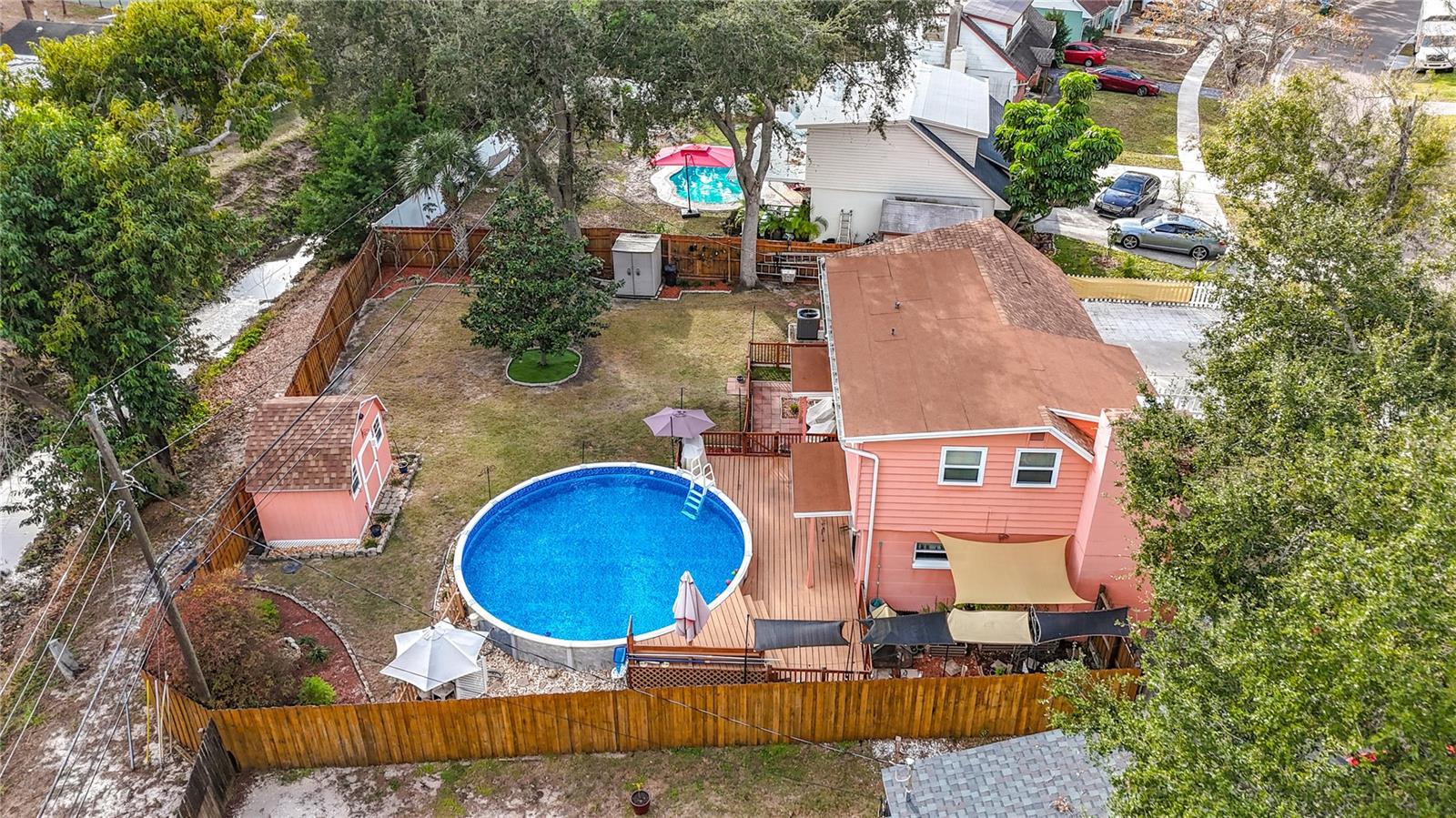 Long Branch Creek is on the left. You have access to it via a pedestrian gate in the fence, just next to the shed on the left. Property is located in flood zone X ( flood insurance is NOT required by a lender)