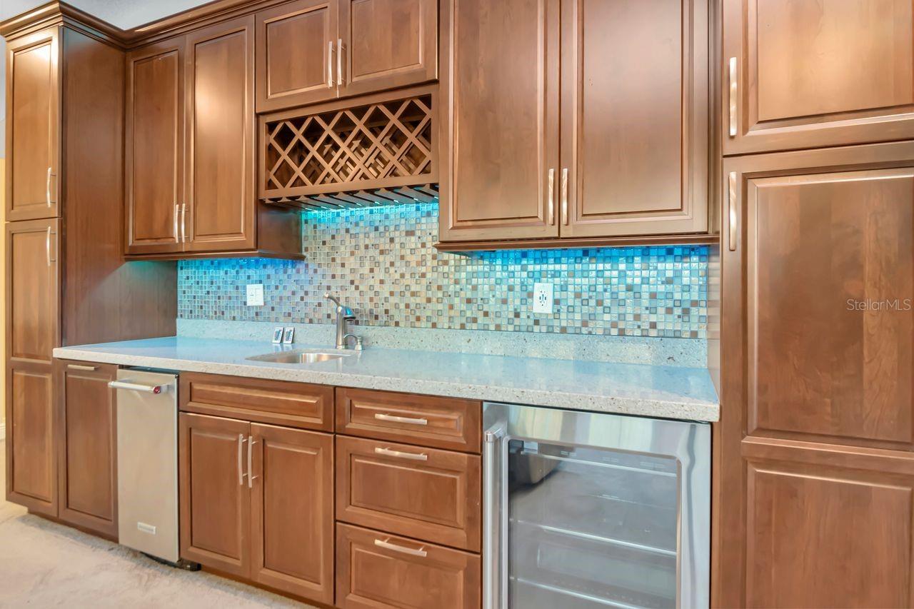 Custom Wet Bar with Built-In Wine Cooler and Ice Maker