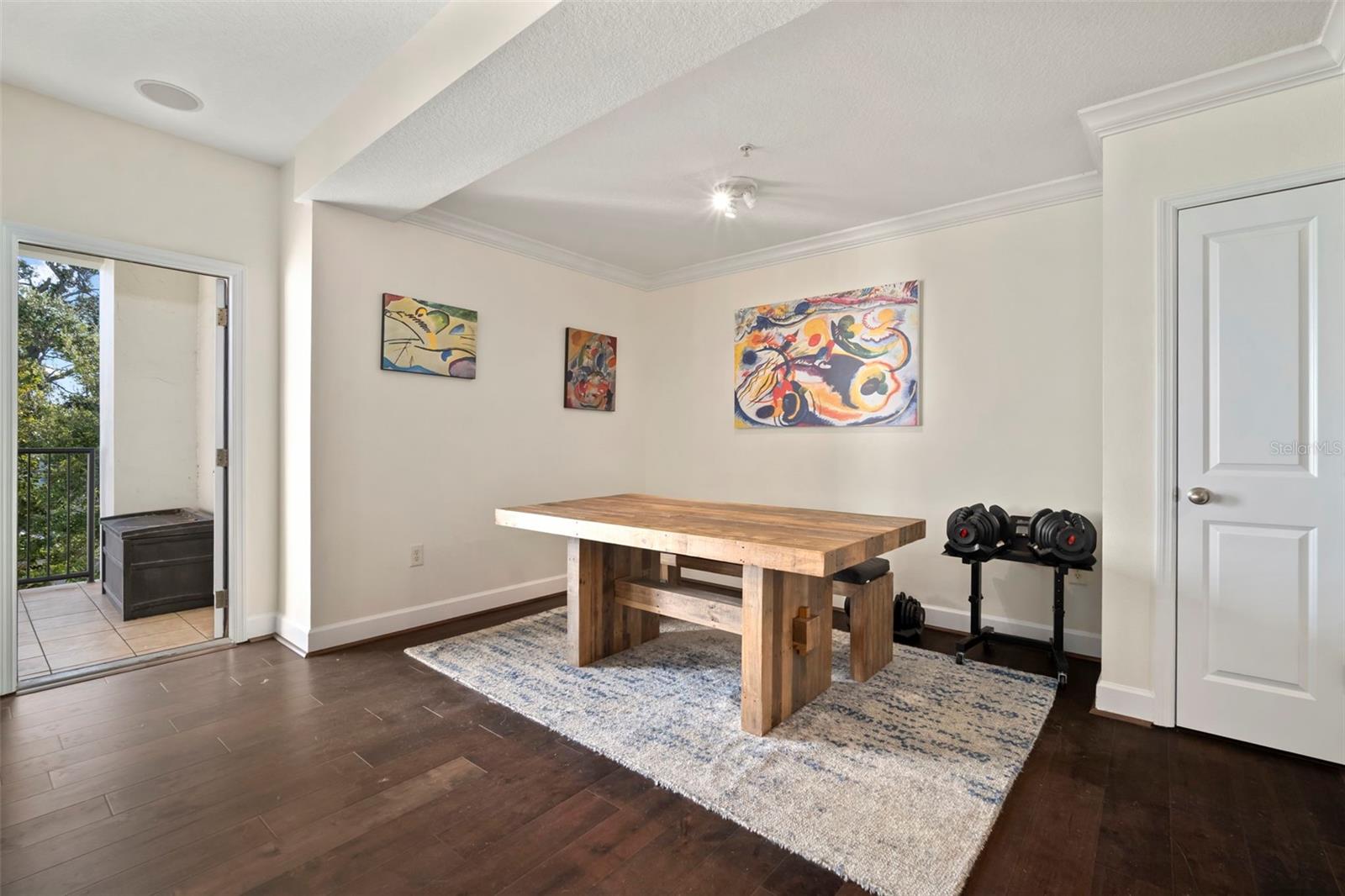 Great room looking to the open door leading to the balcony.