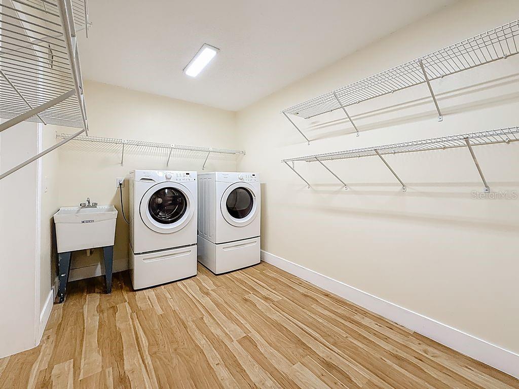 Interior laundry room in unit has utility basin. 8 X 13