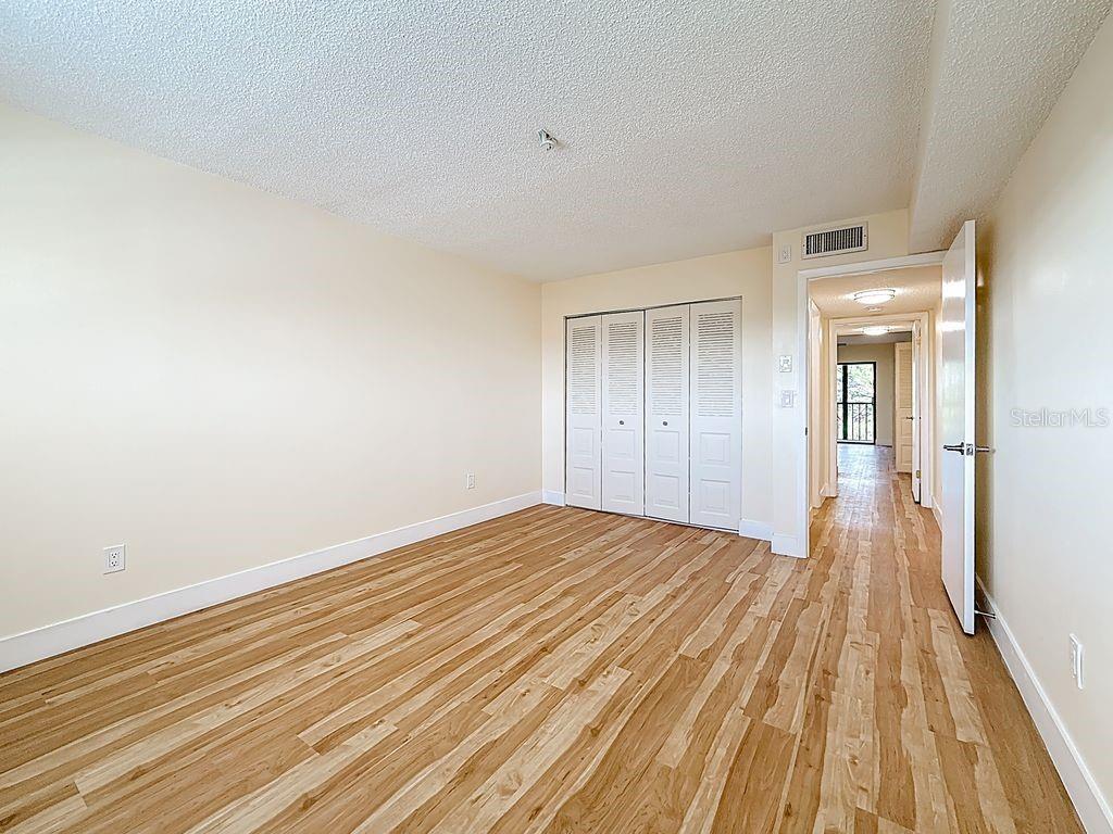 2nd bedroom is split plan - not next to primary bedroom.