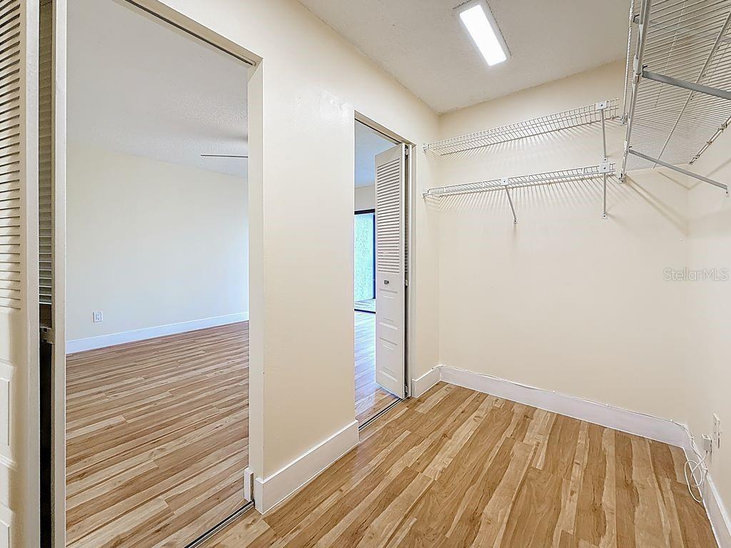 Inside walk-in closet looking out.