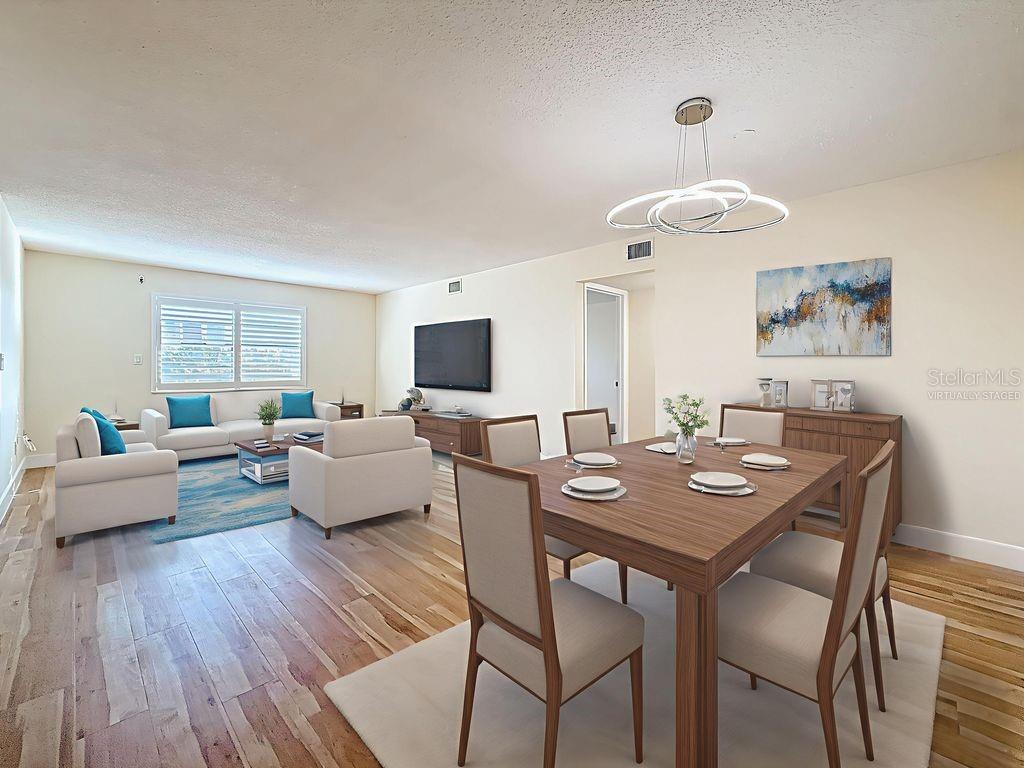 Virtually staged living - dining area