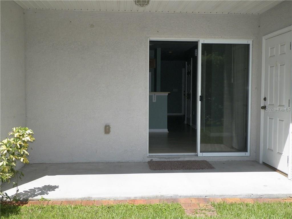 covered patio with storage closet