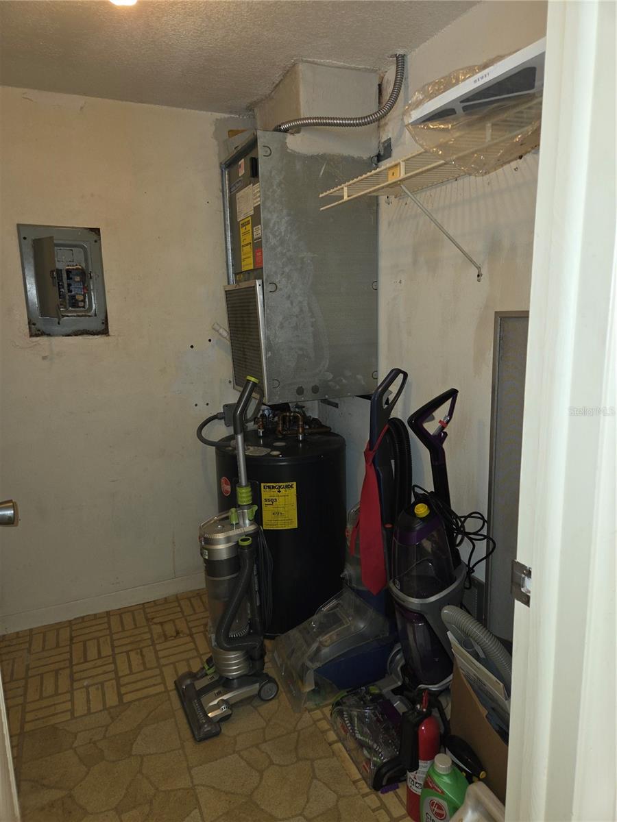 A full sized washer and dryer can be installed in this large closet !