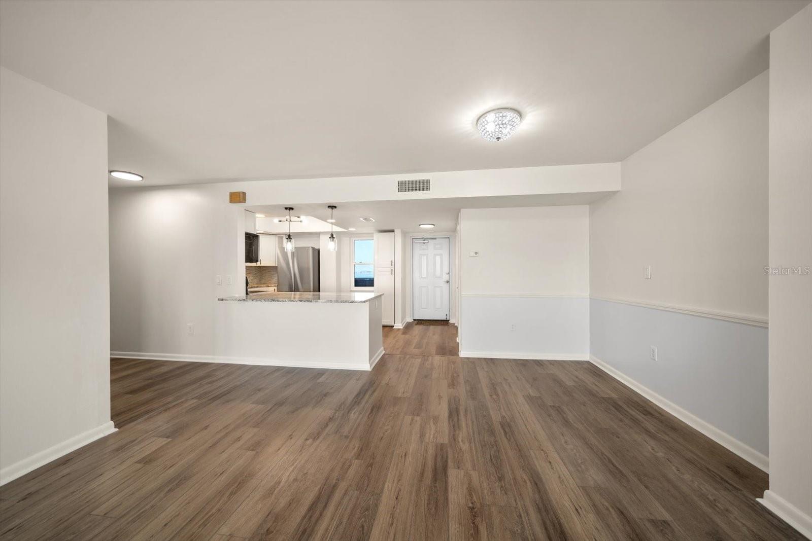 Dining Room Overlooking  Kitchen & Entry