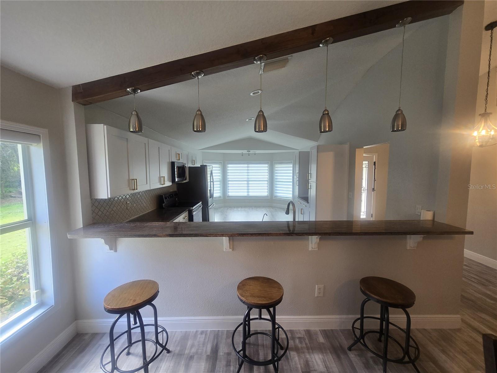 Kitchen view from the dining room and living room