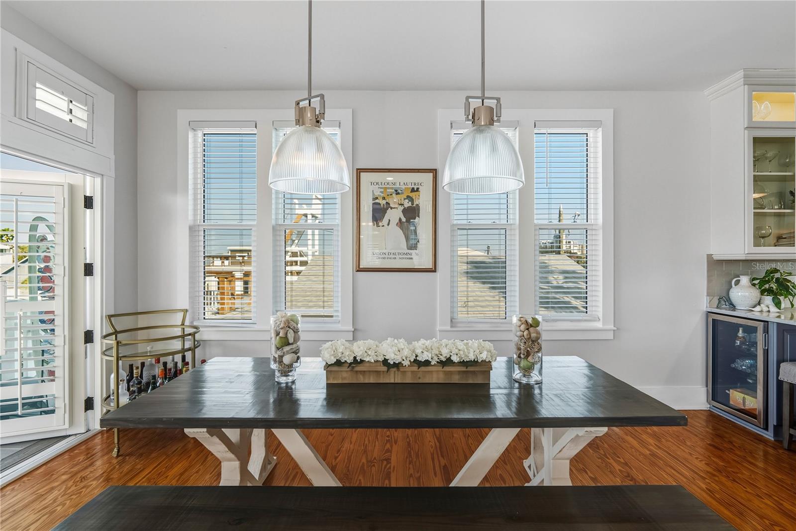 Tall windows & breezy balconies in every direction.