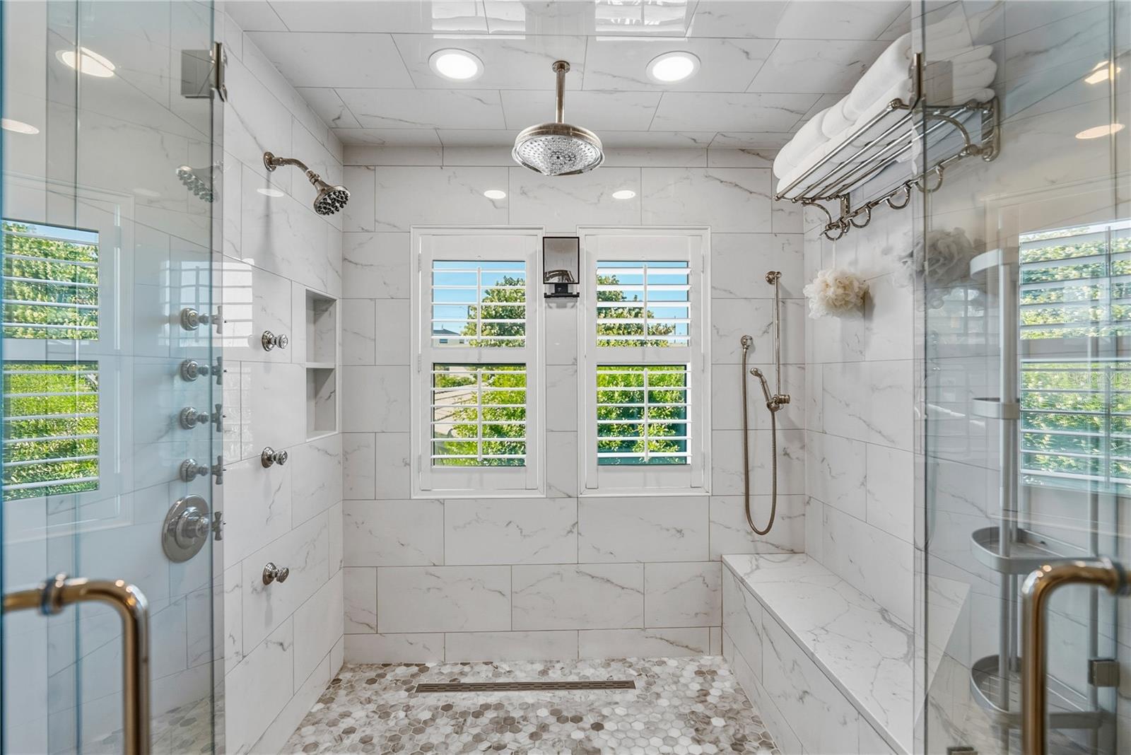 Spa-inspired primary bath with luxury finishes.