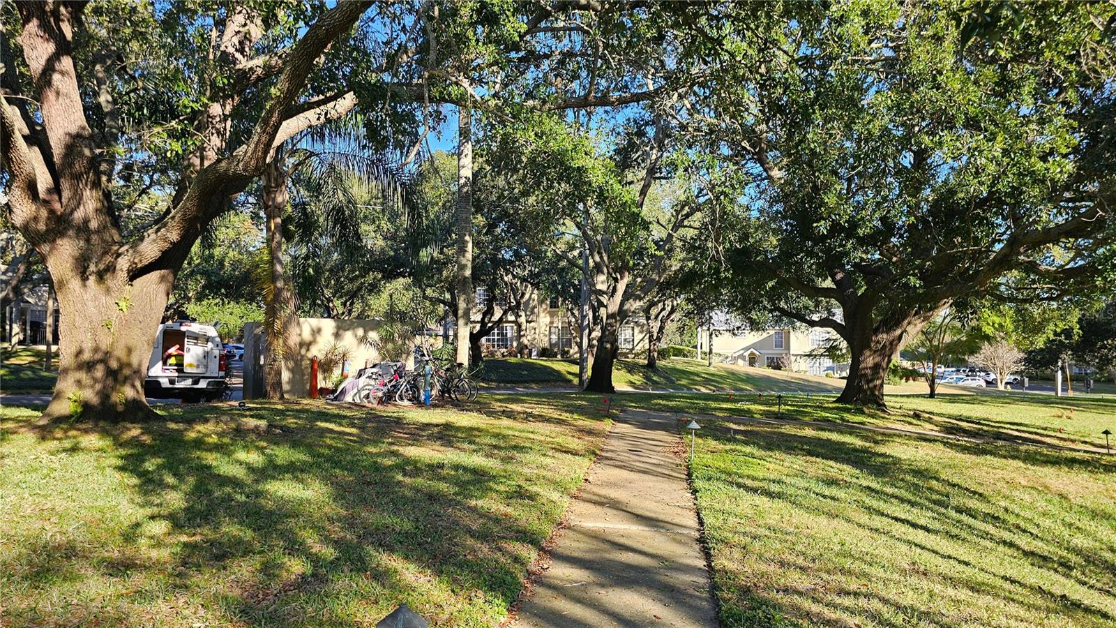 that is your unit in the background. Convenient to Garbage,bike rack and pool