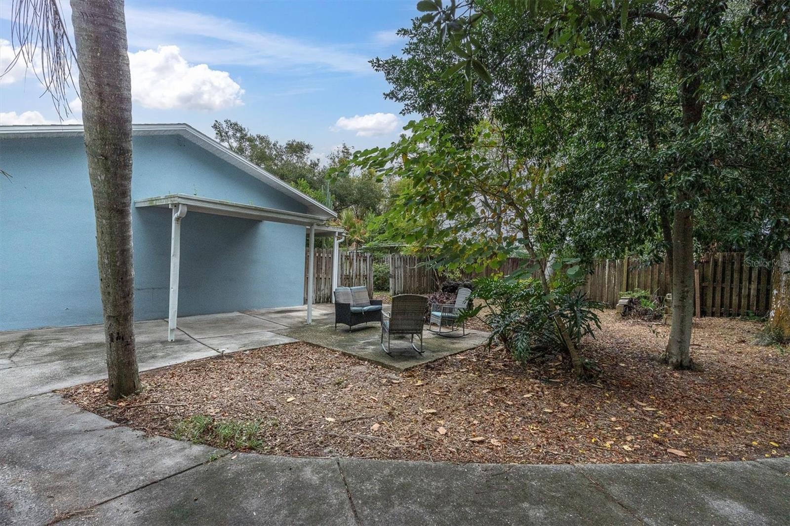 Back yard view looking at the back of the home.