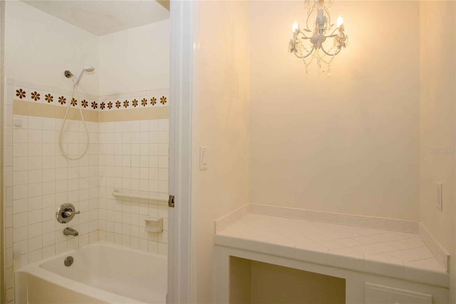 Divided bathroom space for guest convenience