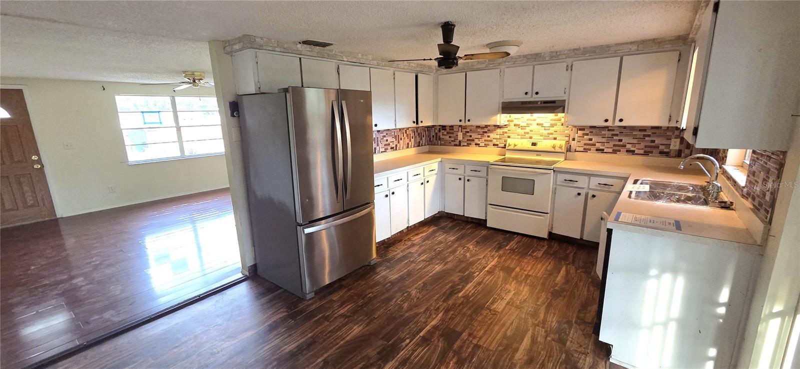 Living Room on left, Kitchen on right