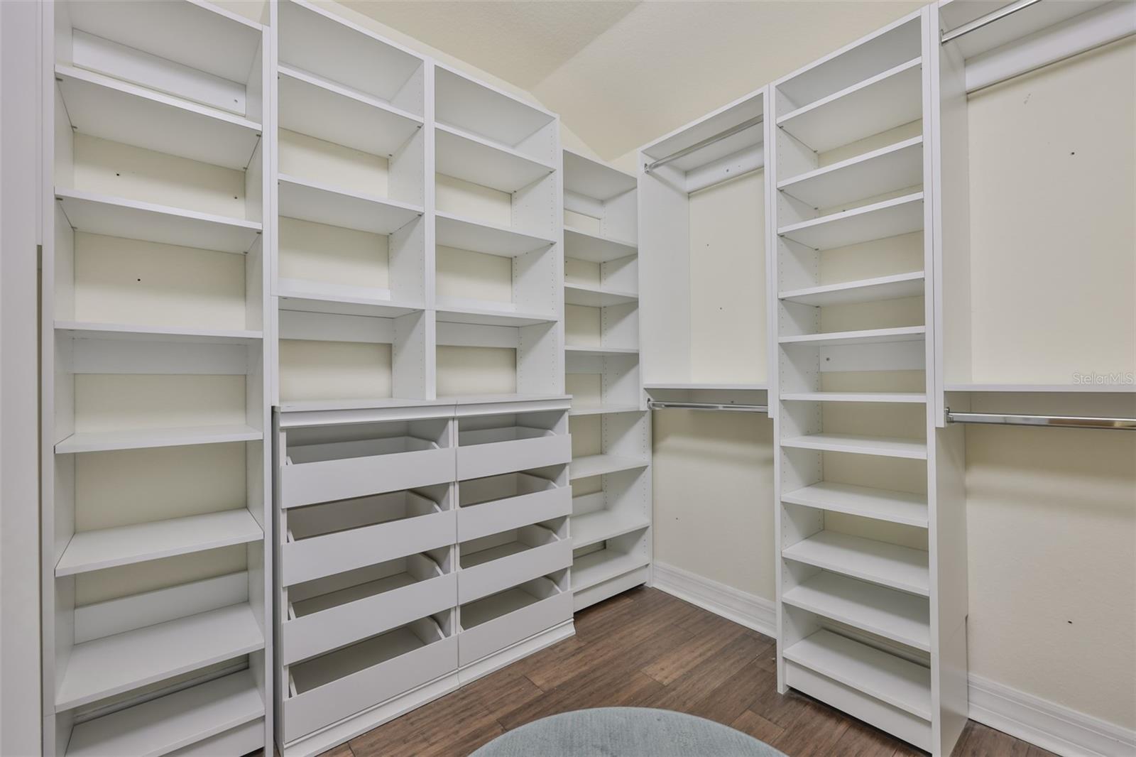 California style closet in the owners suite.