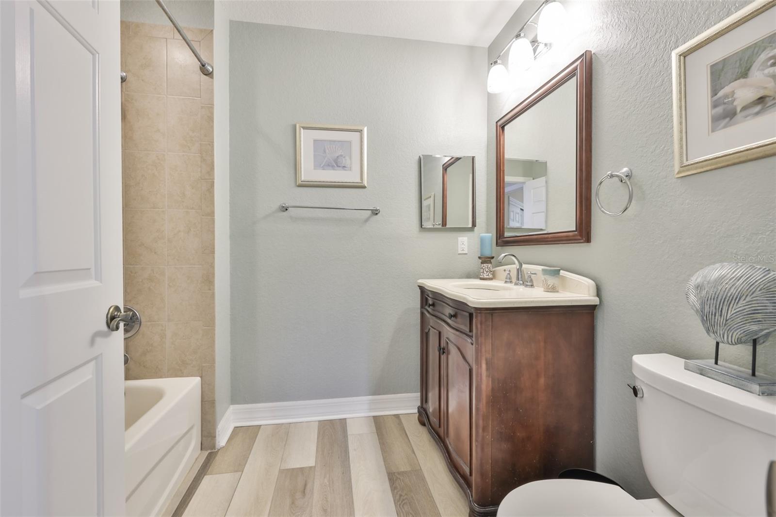 Guest bath is updated and offers comfortable space for guests and family members.
