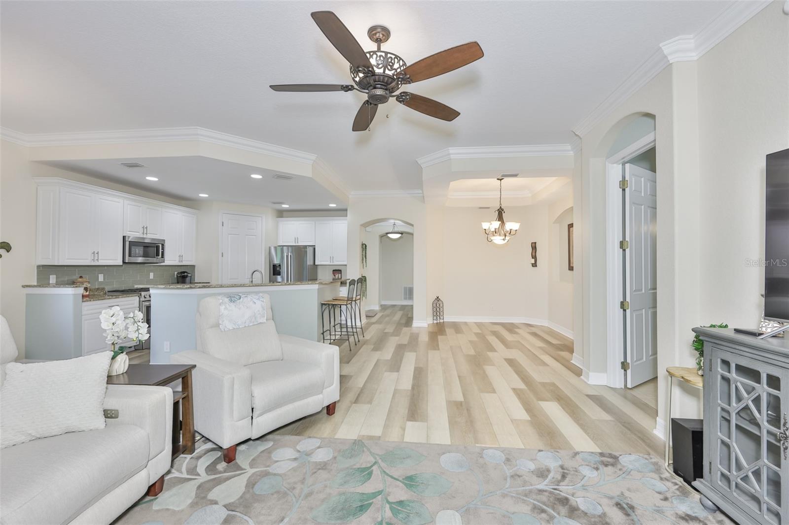 Notice the open living space and continuous flooring.