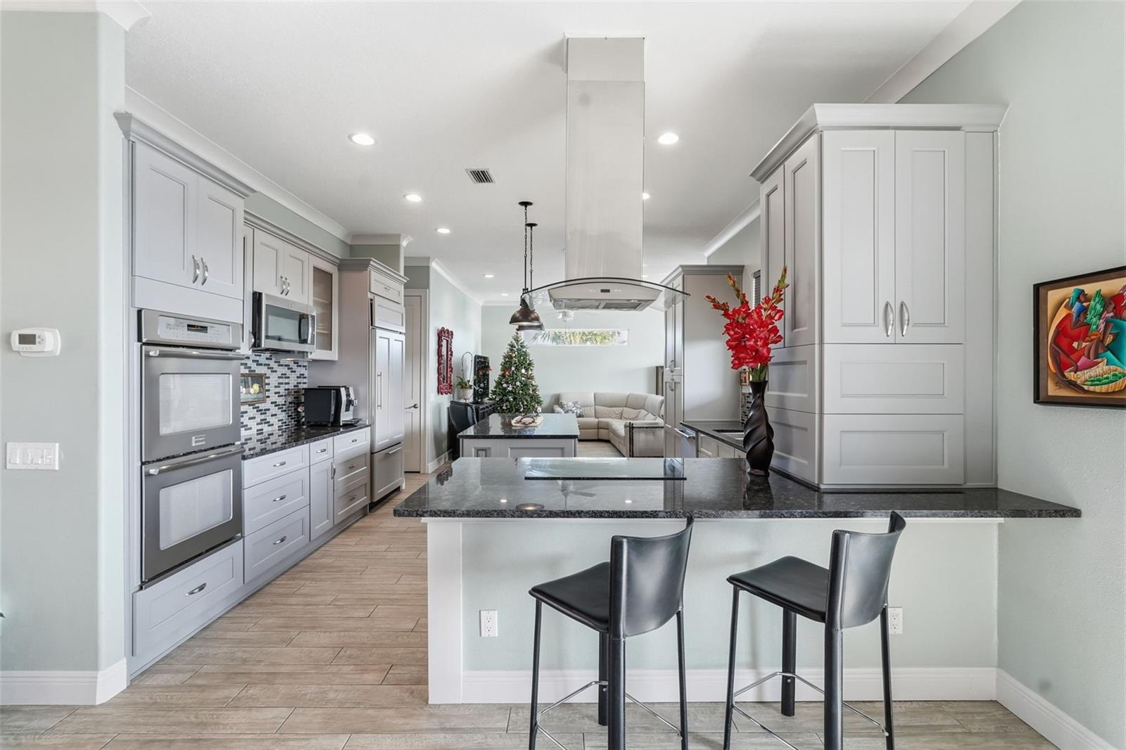 Kitchen is open to the living room and family room.
