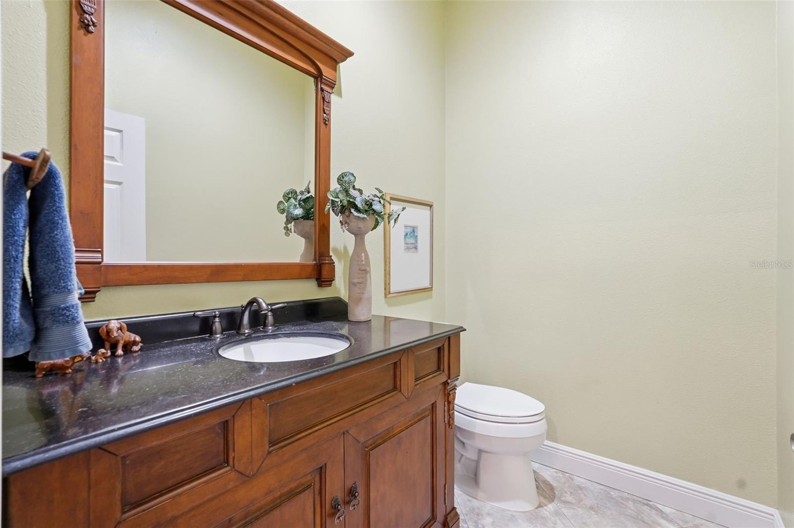 Half bathroom next to the office.