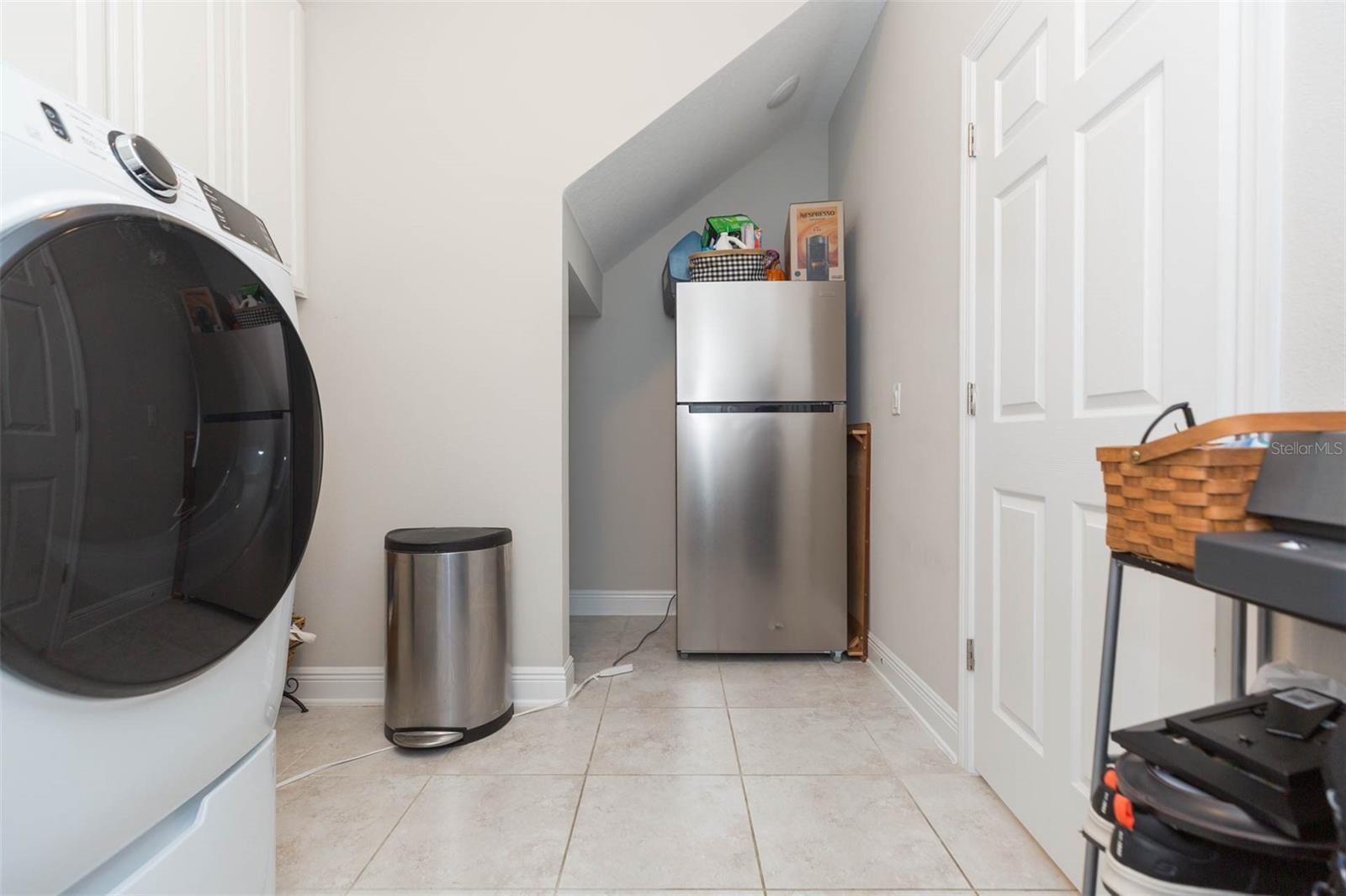 Laundry and extra fridge