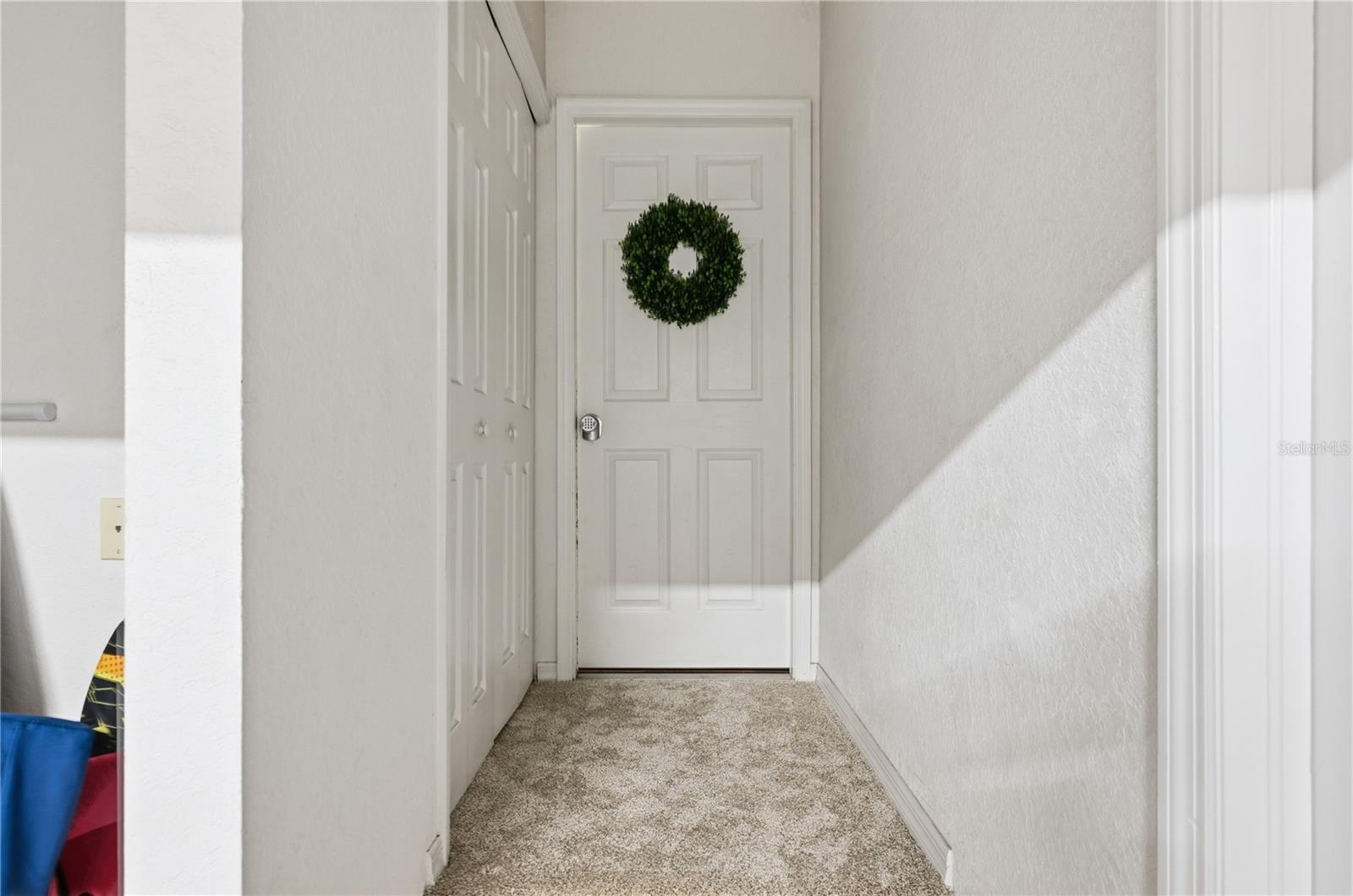 Door to 4th Bedroom that could be utilized as a motherinlaw suite