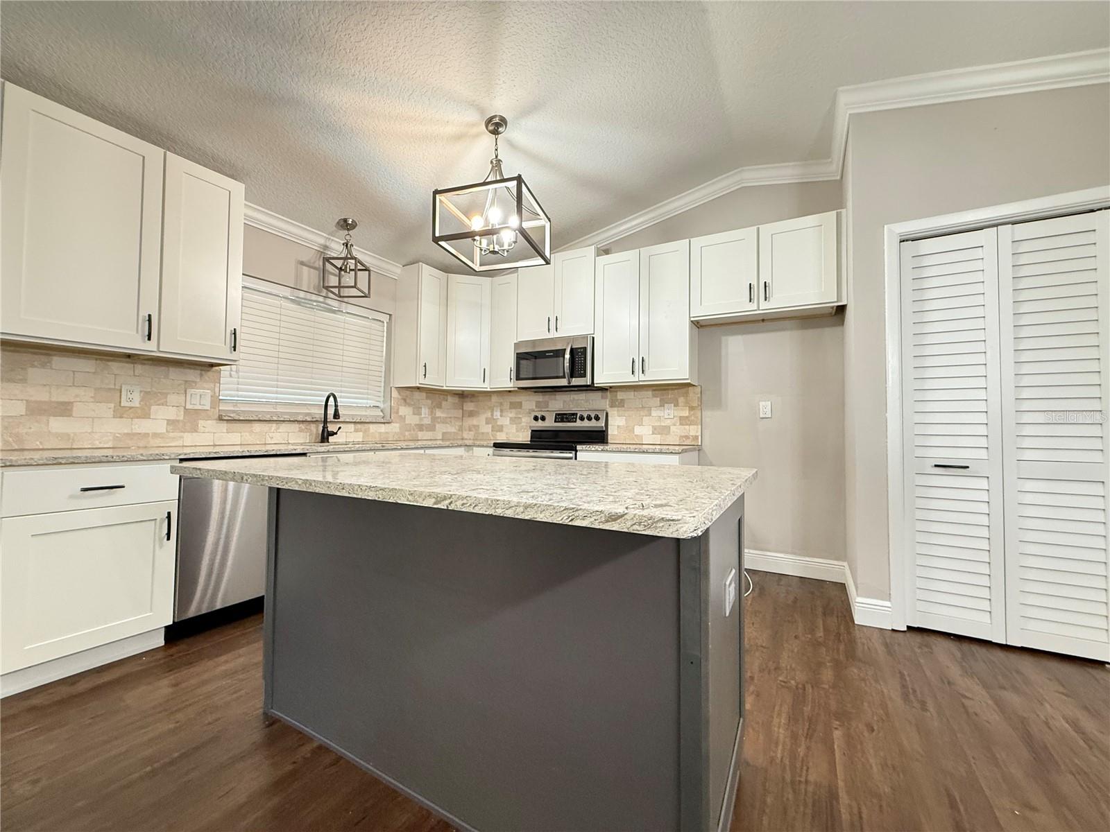 Kitchen showing center island