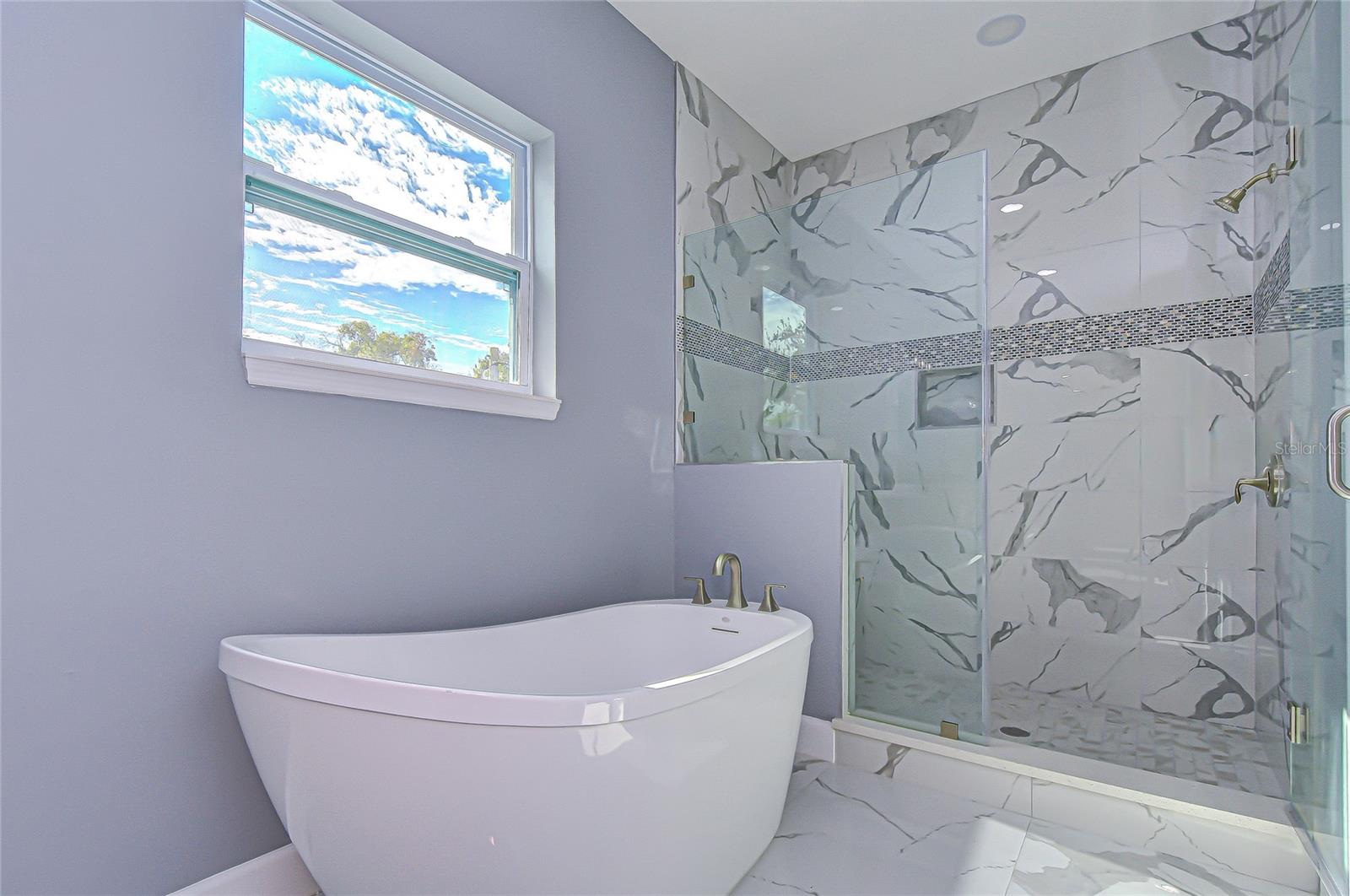 Primary bath w/ similar finishes