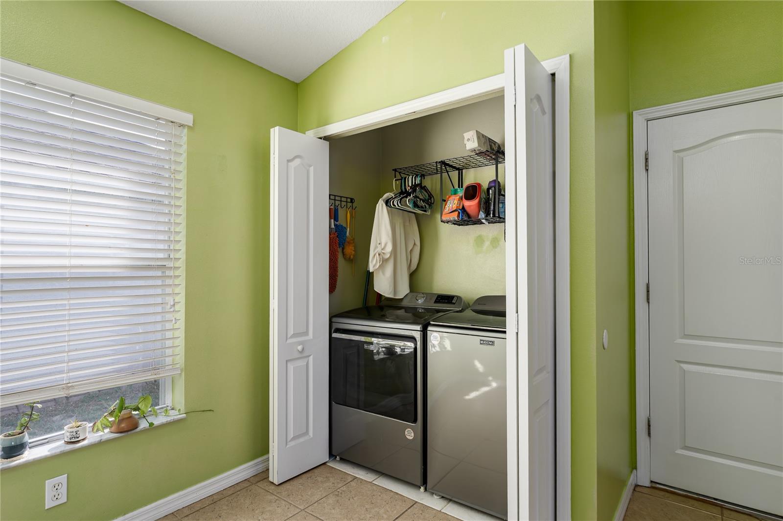 Laundry closet in kitchen