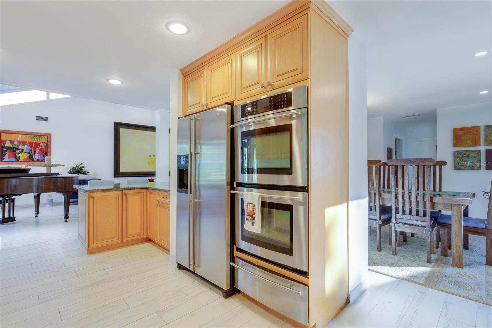 Complete with double ovens, stainless steel appliances…
