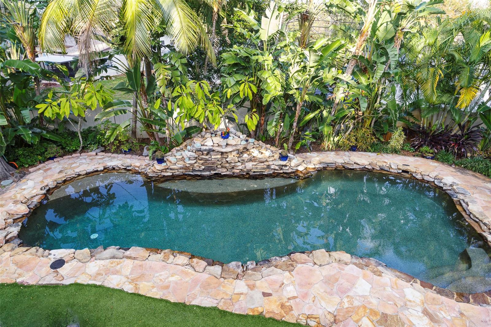 Surrounded by stonework and turf for ease of maintenance.