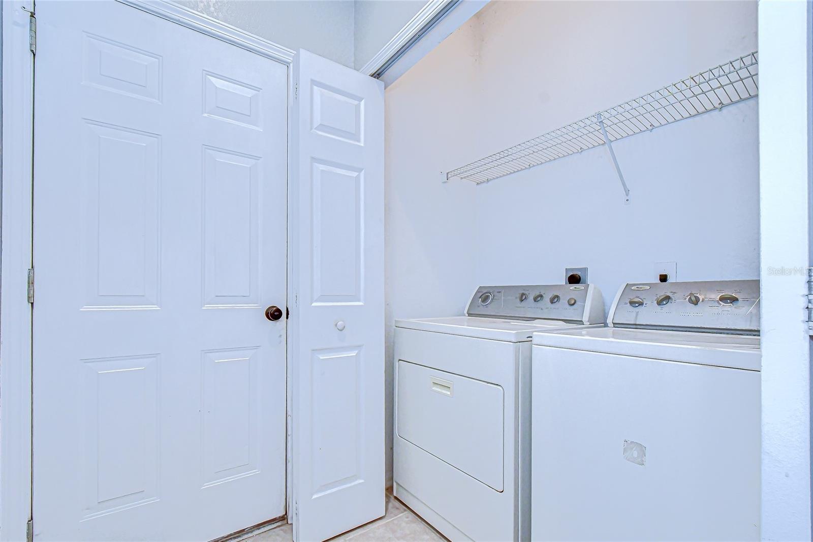 Laundry closet in kitchen!